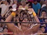 Hogan Hugs The Belt